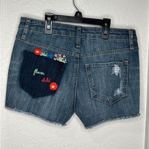 Denim shirts with floral detail